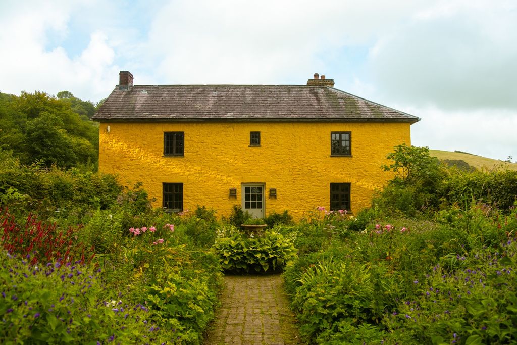 Image may contain Architecture Building Cottage House Housing Villa Outdoors Manor and Nature