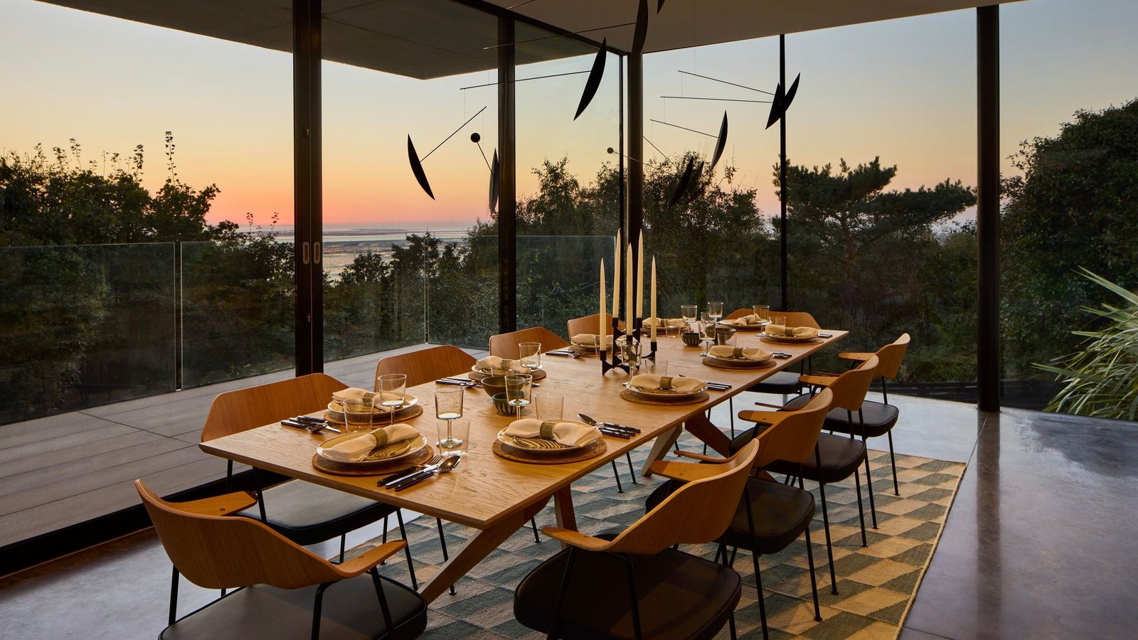 Image may contain Furniture Table Dining Table Architecture Building Dining Room Indoors Room Tabletop and Chair