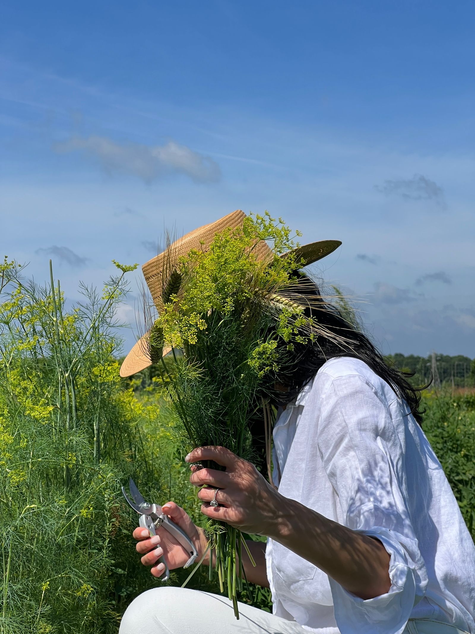 Image may contain Nature Outdoors Countryside Accessories Jewelry Ring Adult Person Rural Farm and Alcohol