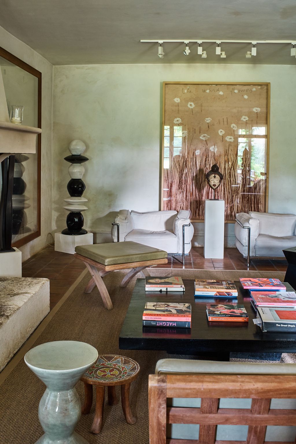 Image may contain Coffee Table Furniture Table Architecture Building Indoors Living Room Room Book and Publication