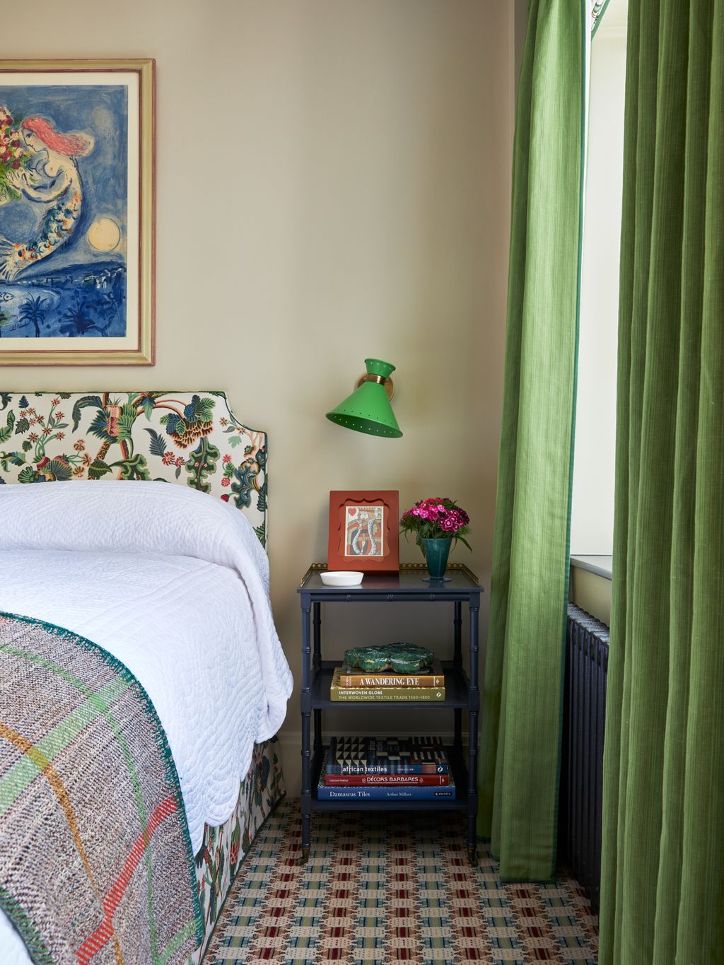 Image may contain Art Painting Bed Furniture Bedroom Dorm Room Indoors Room Home Decor Lamp and Cushion