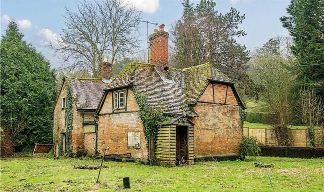 Image may contain Architecture Building Housing Outdoors House Nature and Manor
