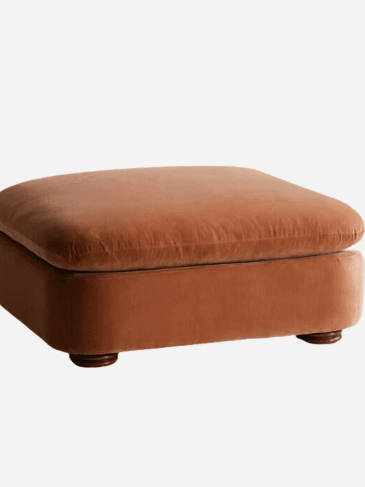 Image may contain Furniture and Ottoman