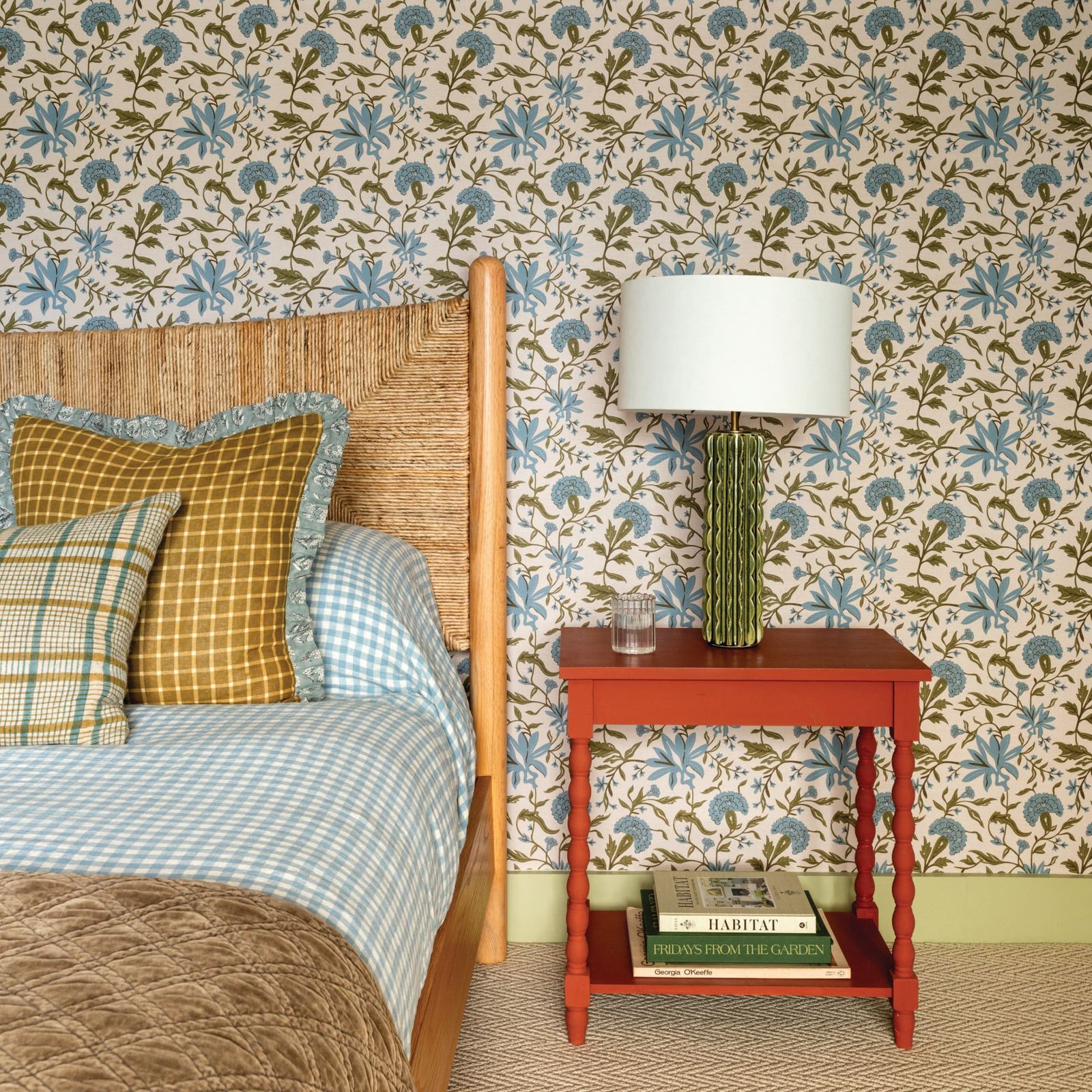 Image may contain Lamp Book Publication Cup Indoors Interior Design Bed Furniture Cushion Home Decor and Pillow