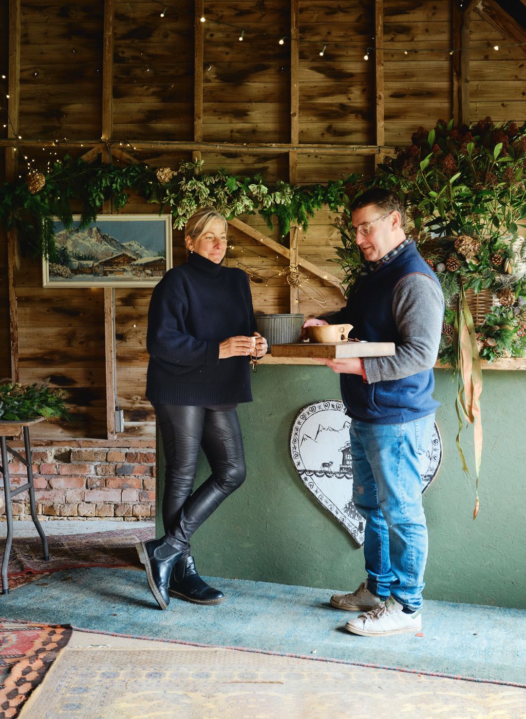 Image may contain Dirk Schuebel Susan Lindauer Clothing Pants Plant Potted Plant Furniture Table Footwear and Shoe