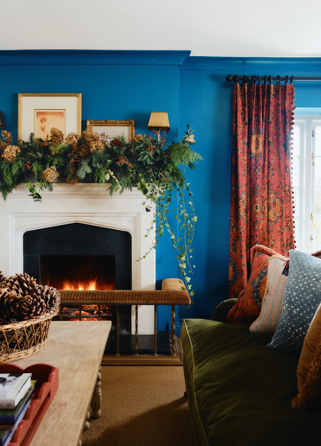 Image may contain Fireplace Indoors Couch Furniture Hearth Home Decor Art Painting Desk Table and Architecture