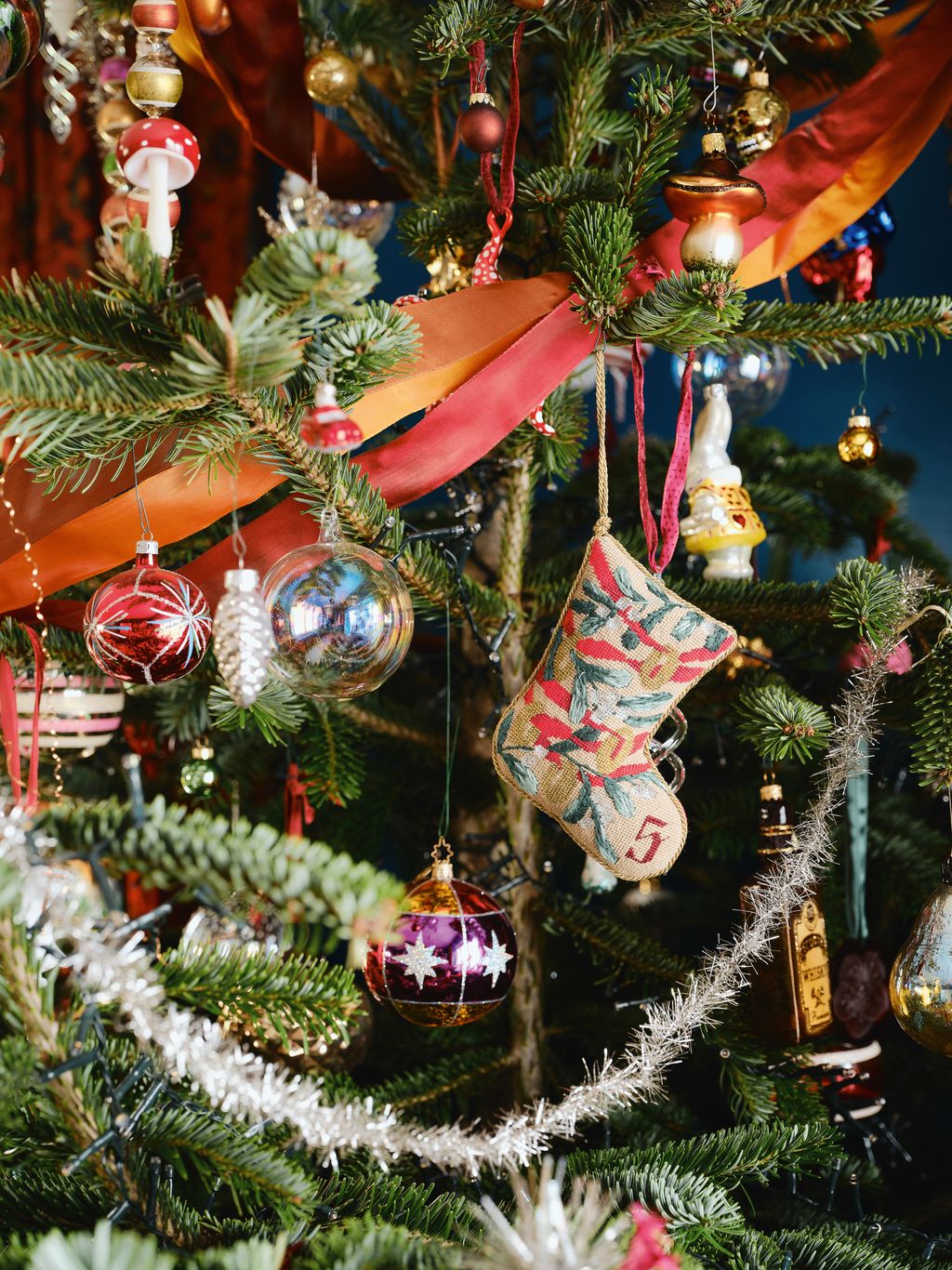 Image may contain Christmas Christmas Decorations Festival Christmas Tree Christmas Tree Ornaments and Person