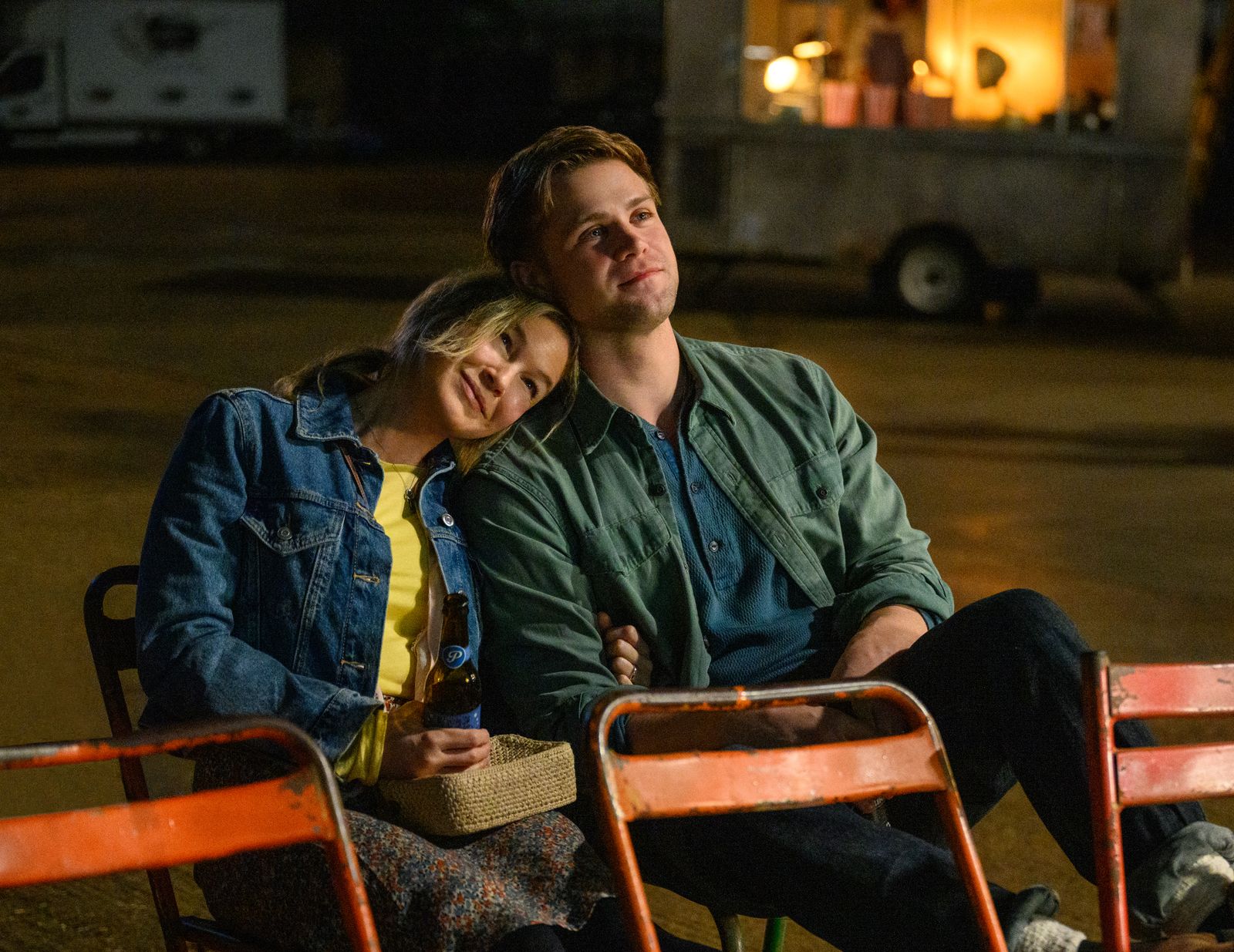 Image may contain Rene Zellweger Face Head Person Photography Portrait Clothing Coat Jacket Pants and Lighting