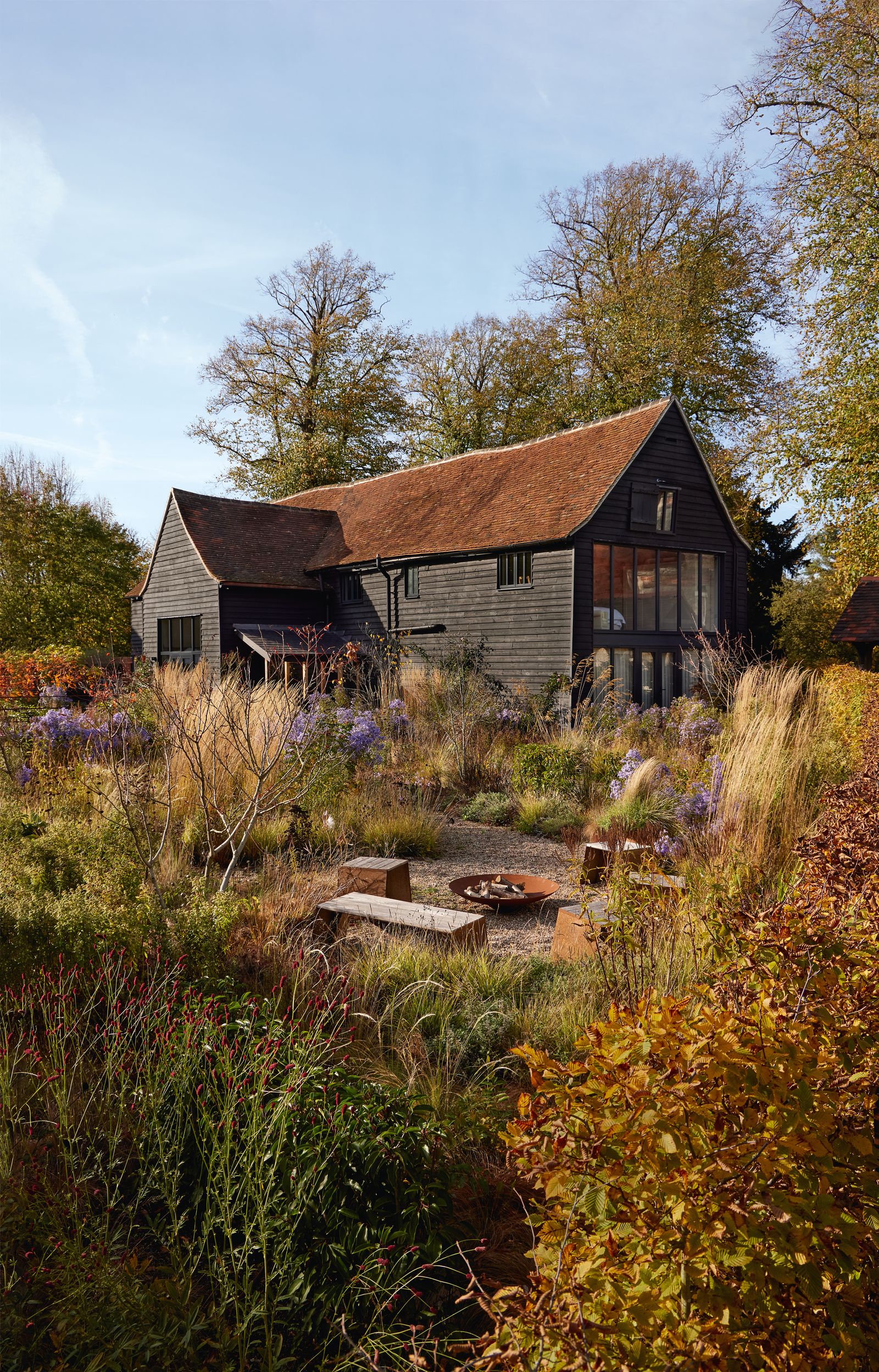 Image may contain Architecture Building Outdoors Shelter Cottage House Housing Countryside Hut Nature and Rural