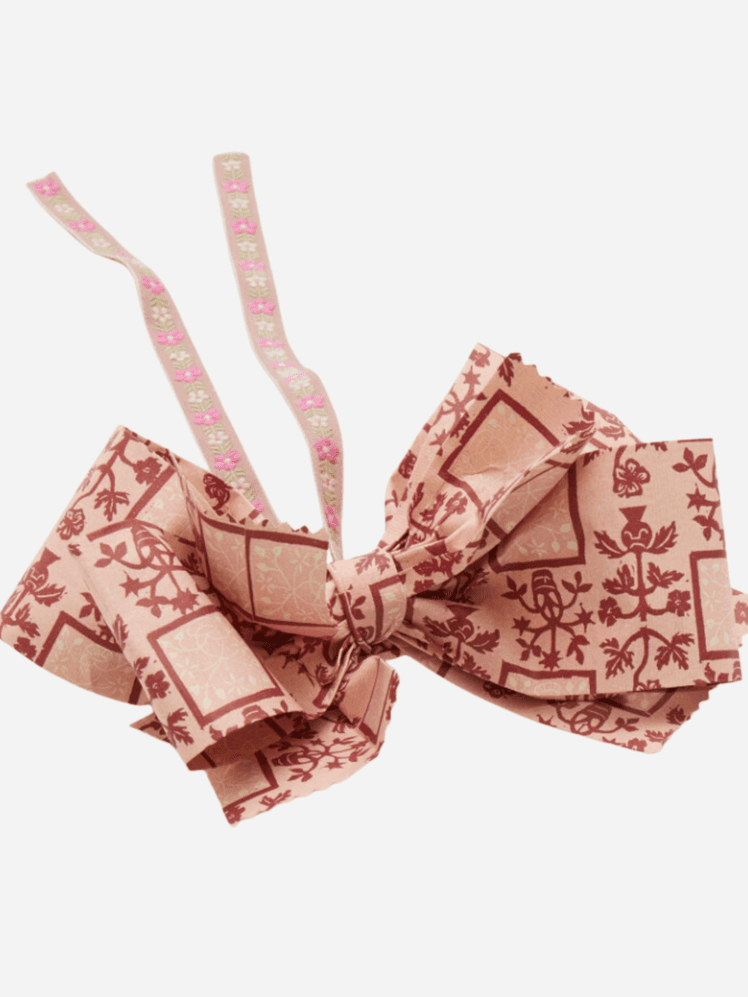 Image may contain: Accessories, Formal Wear, and Tie