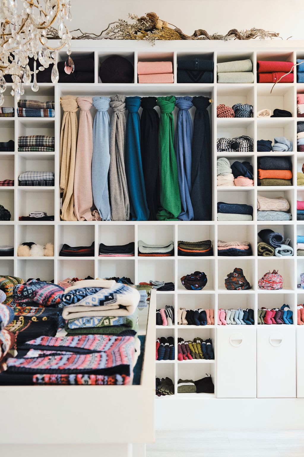 Image may contain Furniture Closet Indoors Toy Accessories Formal Wear Tie Room WalkIn Closet Bag and Handbag