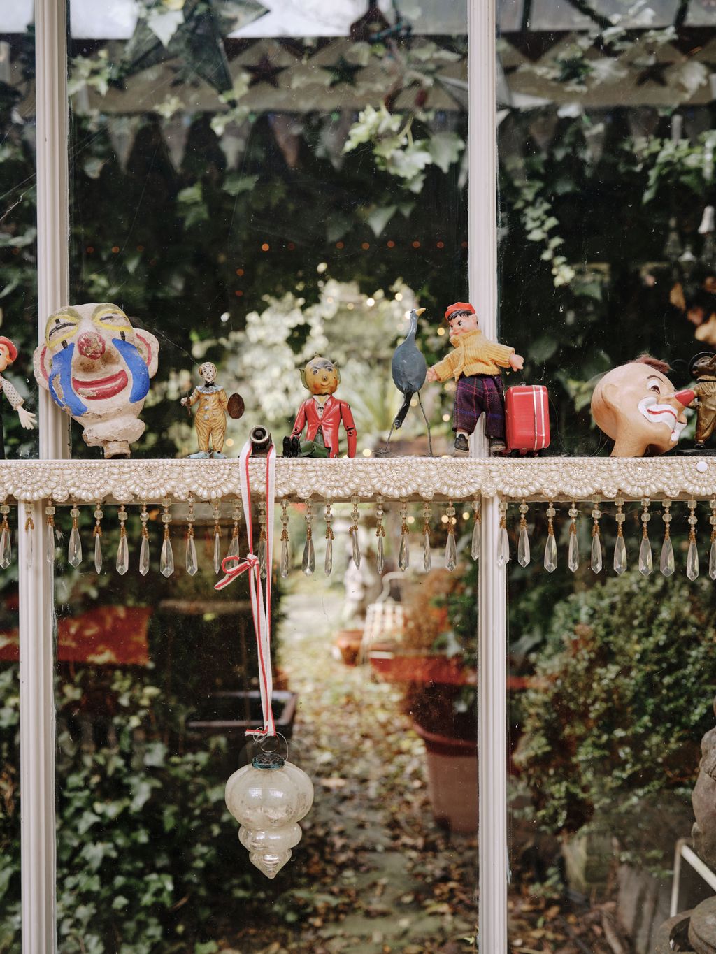 Image may contain Person Baby Clothing Footwear Shoe Hat Adult Animal and Bird