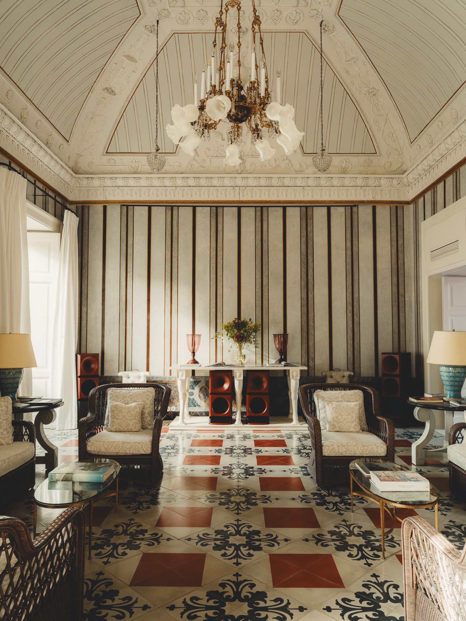 Image may contain Home Decor Chandelier Lamp Book Publication Indoors Reception Reception Room and Room
