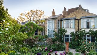 Image may contain Architecture Building Cottage House Housing Garden Nature Outdoors City Plant and Vegetation