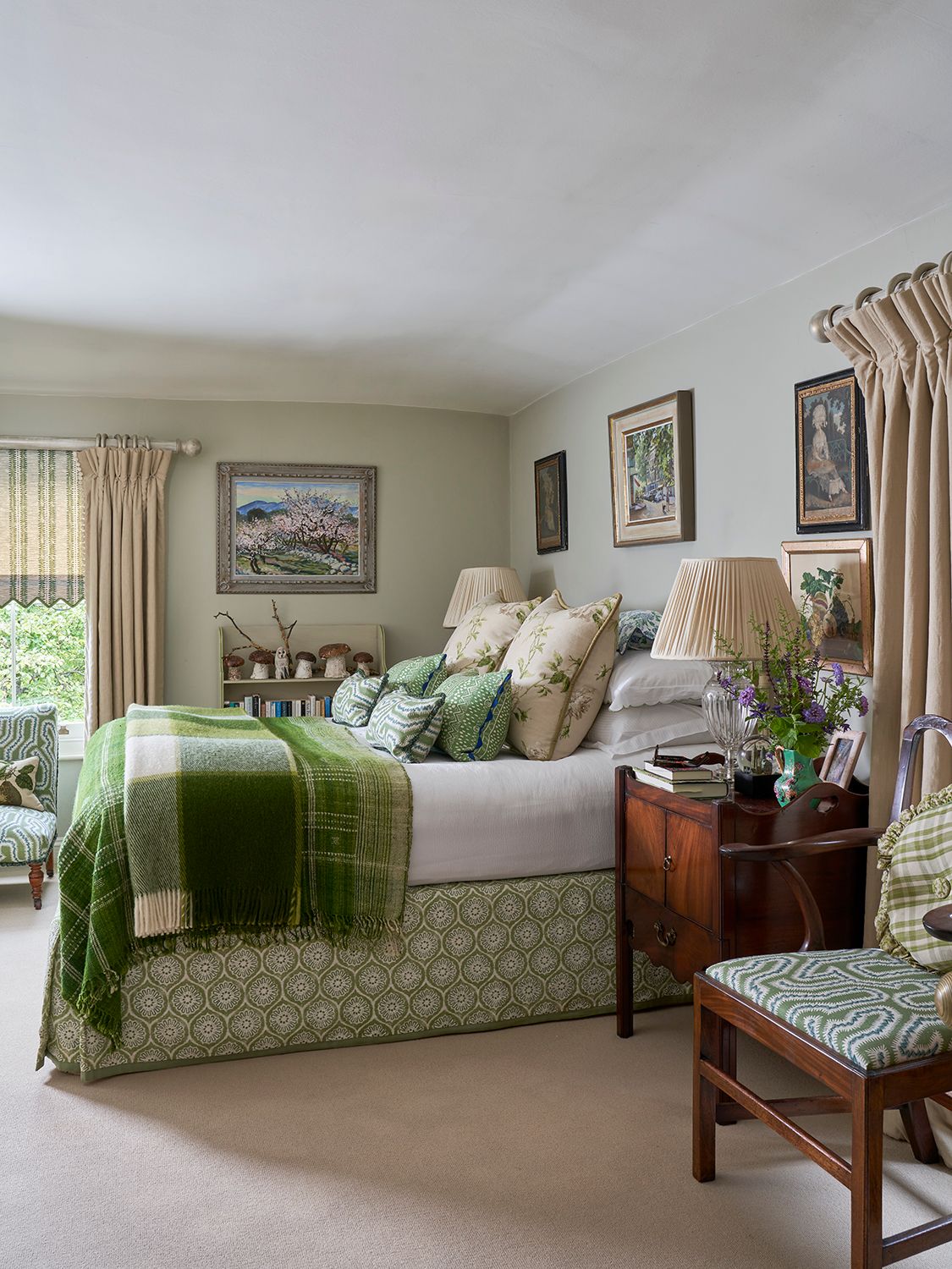 Image may contain Home Decor Chair Furniture Art Painting Lamp Bed Cushion Bedroom Indoors and Room