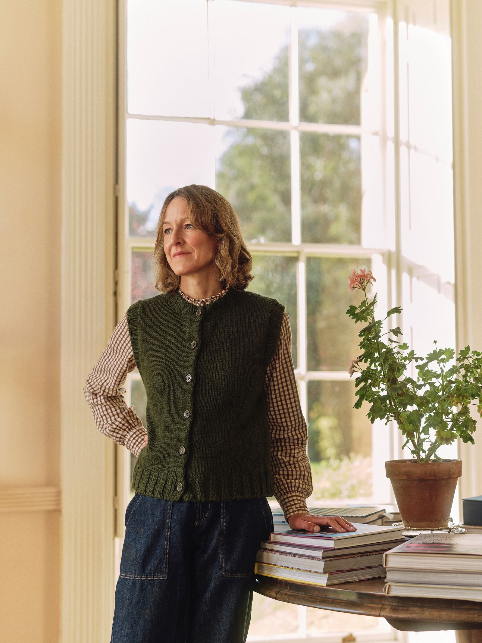 Image may contain Jill Dawson Clothing Knitwear Sweater Adult Person Plant Accessories Jewelry and Necklace