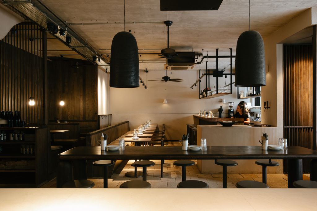 Image may contain Indoors Restaurant Architecture Building Dining Room Dining Table Furniture Room and Table