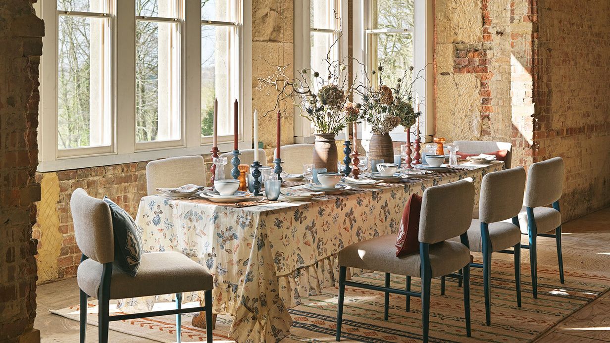 Image may contain: Architecture, Building, Dining Room, Dining Table, Furniture, Indoors, Room, Table, Tabletop, and Chair