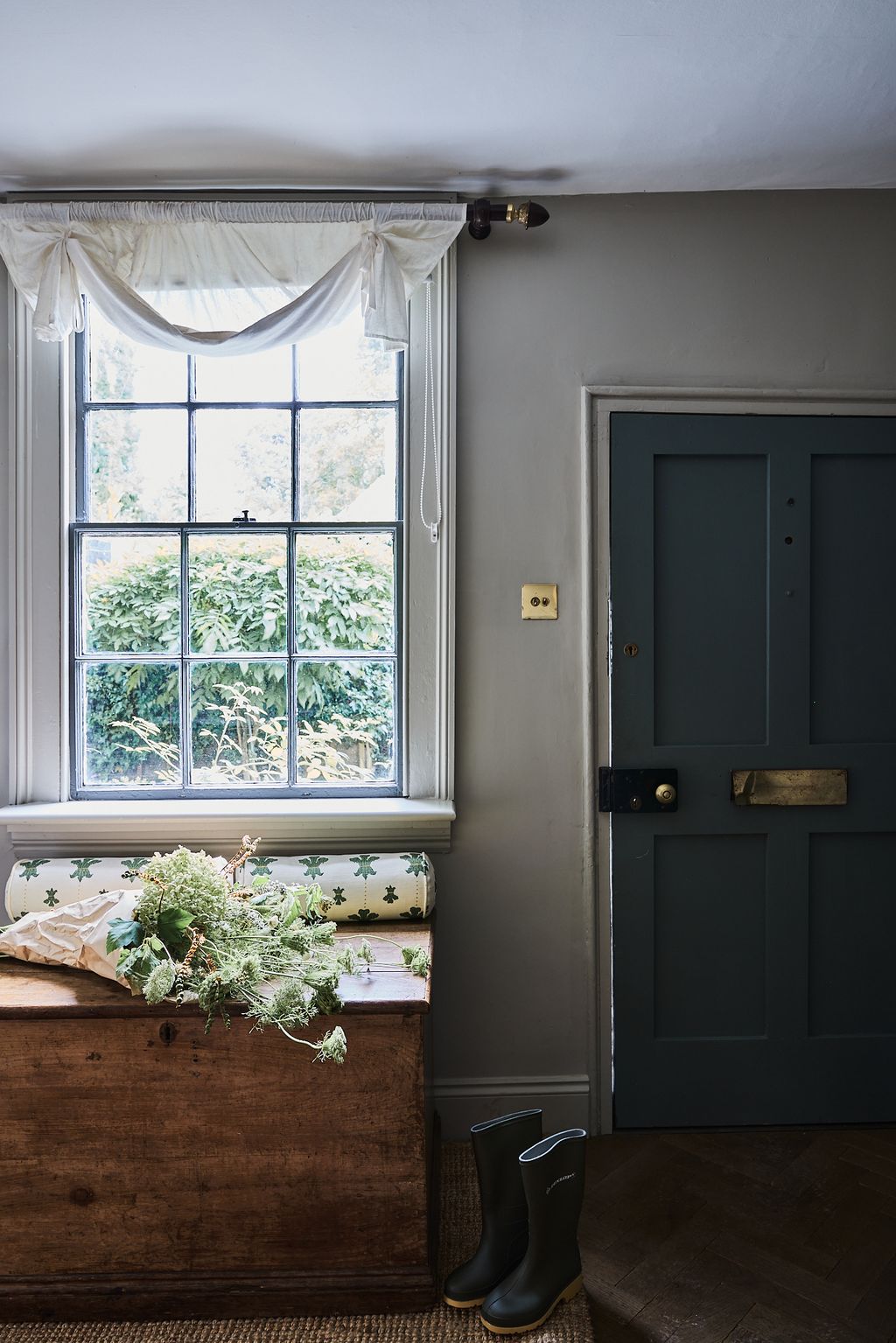 Image may contain Window Clothing Footwear Shoe Bay Window Windowsill Indoors and Interior Design