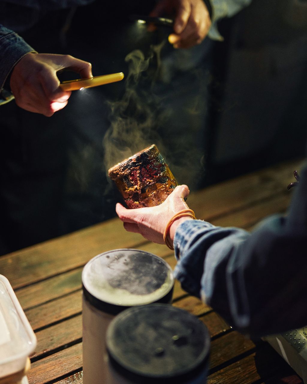 Image may contain Head Person Face Adult Cup Smoke Accessories Bracelet and Jewelry