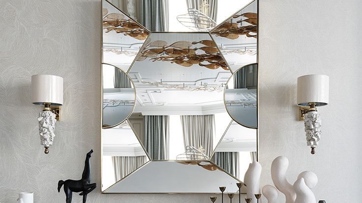 Image may contain: Indoors, Interior Design, Lamp, Furniture, Book, Publication, and Person