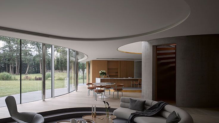 Image may contain: Couch, Furniture, Architecture, Building, Indoors, Living Room, Room, Interior Design, Table, and Chair