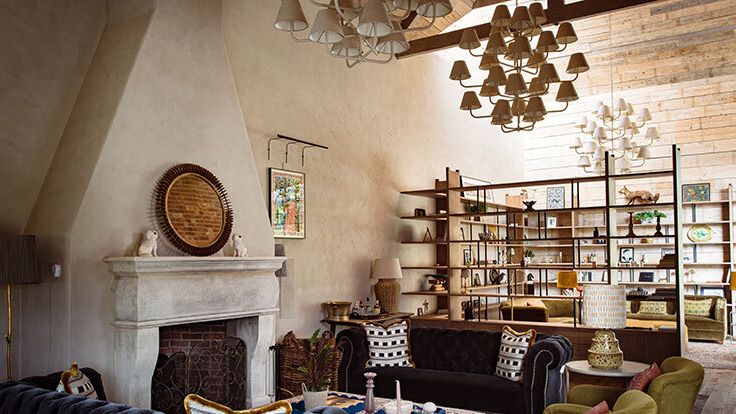 Image may contain: Home Decor, Lamp, Architecture, Building, Furniture, Indoors, Living Room, Room, Art, Painting, and Couch