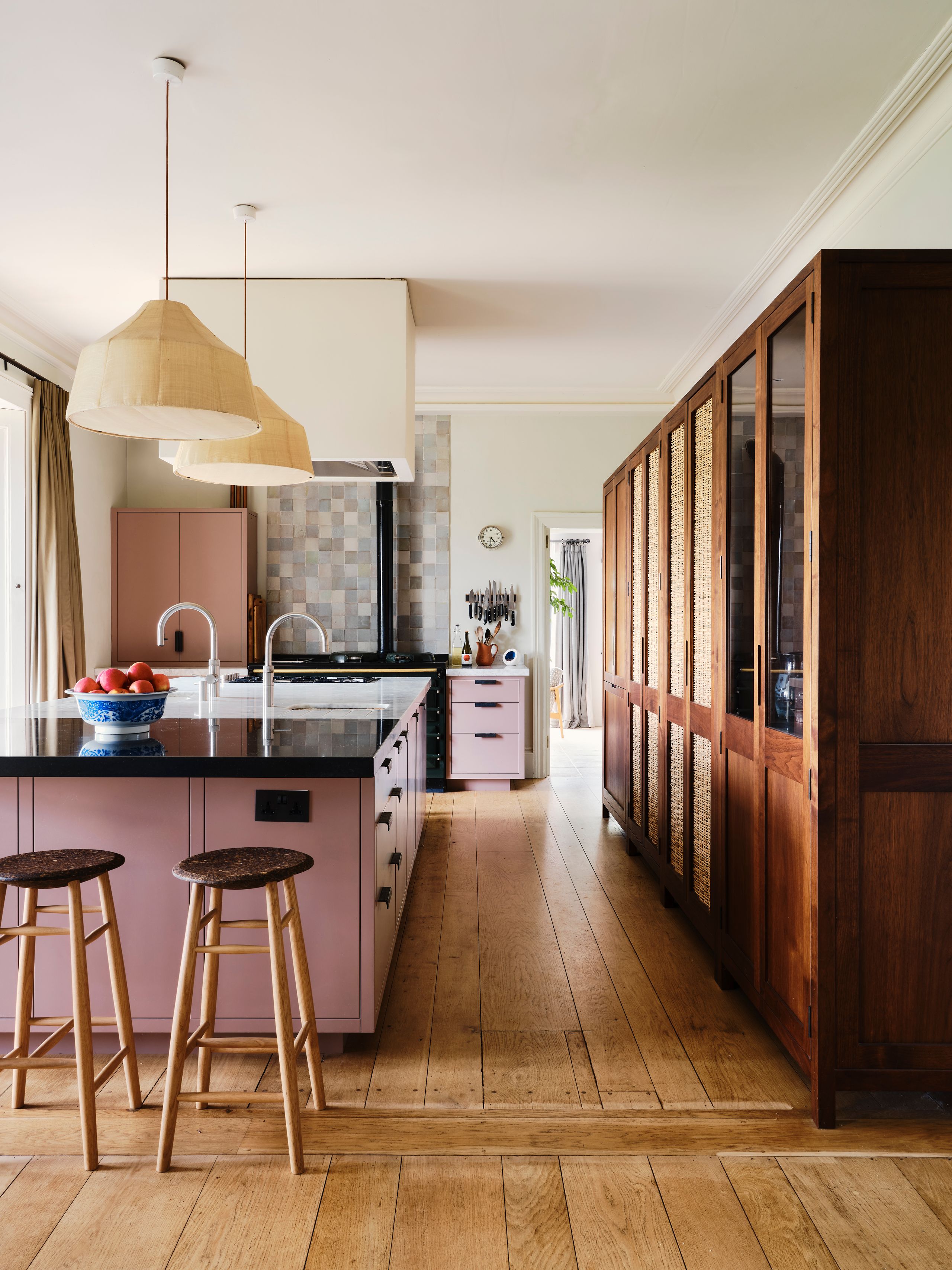 Image may contain: Indoors, Interior Design, Kitchen, Wood, Floor, Hardwood, Lamp, Bar Stool, Furniture, and Home Decor