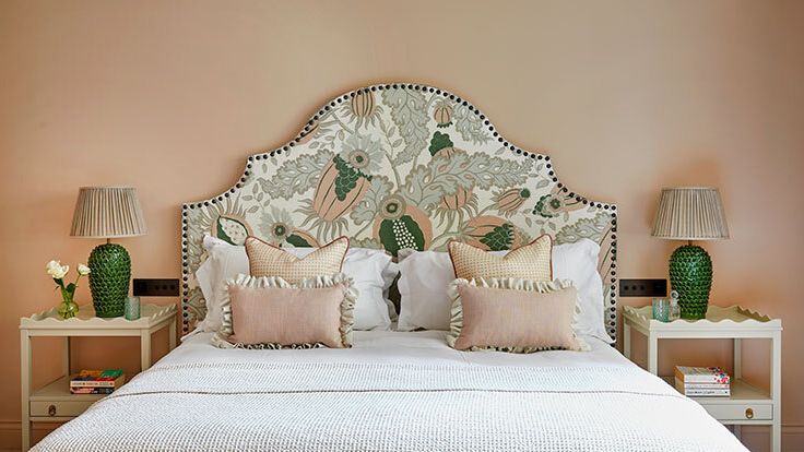 Image may contain: Cushion, Home Decor, Lamp, Bed, Furniture, Pillow, Cup, Table Lamp, Bedroom, Indoors, and Room