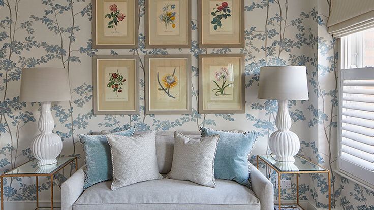 Image may contain: Lamp, Home Decor, Cushion, Couch, Furniture, Art, Painting, Pillow, Desk, and Table