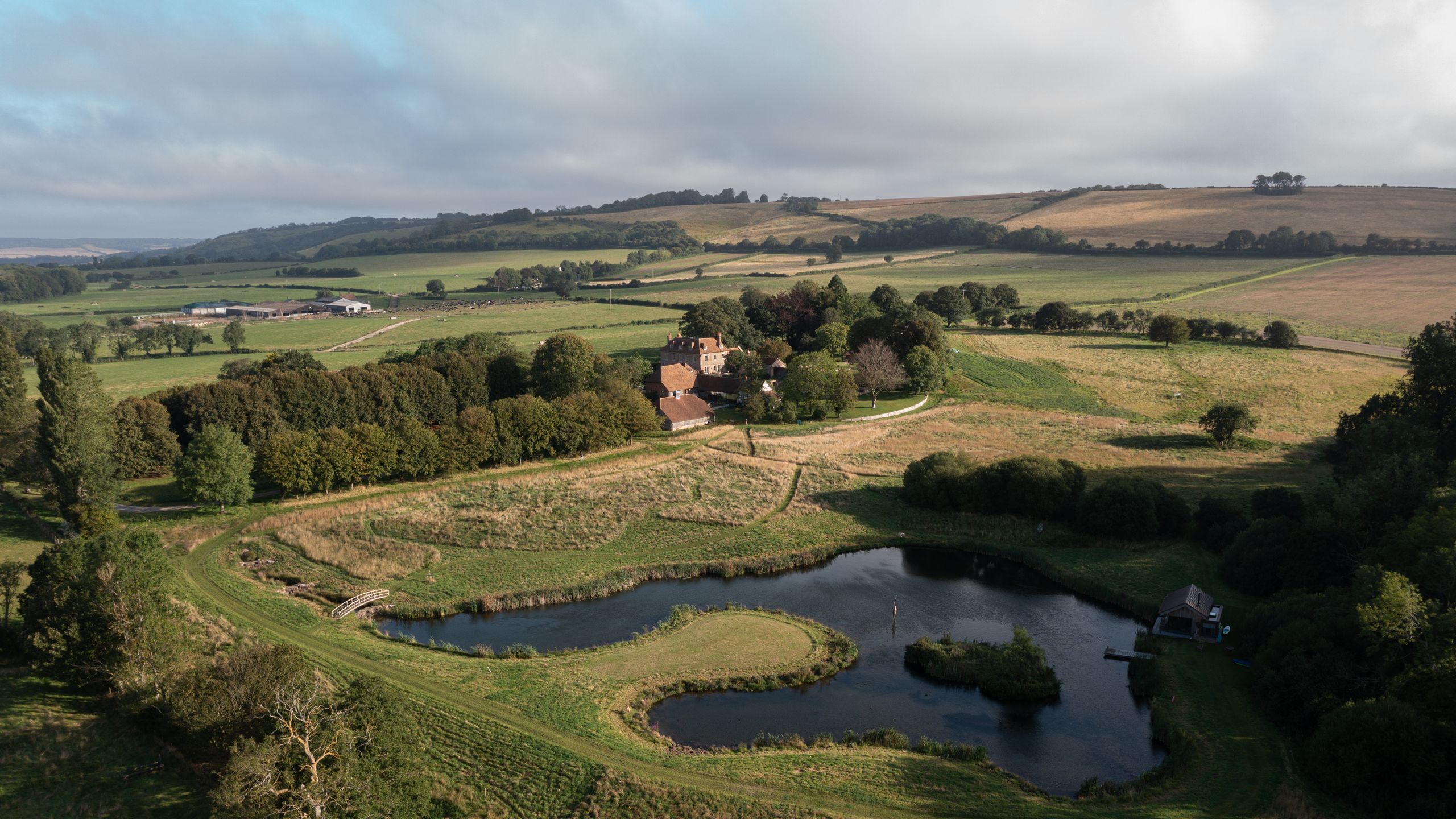 Image may contain: Outdoors, Nature, Lake, Water, and Aerial View