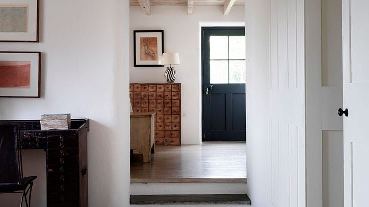 Image may contain: Indoors, Interior Design, Floor, Lamp, Architecture, Building, Foyer, Art, Painting, and Flooring