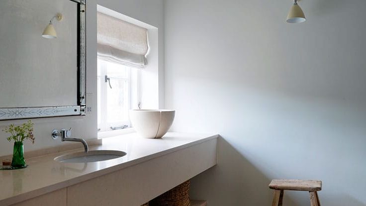 Image may contain: Sink, Lamp, Sink Faucet, Corner, and Furniture