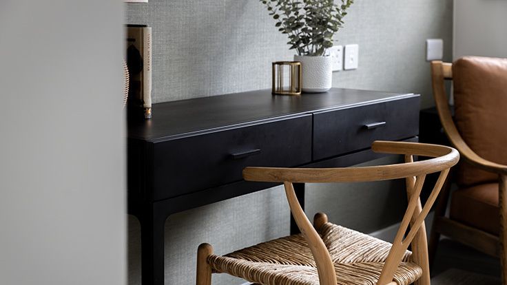 Image may contain: Furniture, Table, Desk, Chair, Plant, Indoors, and Interior Design