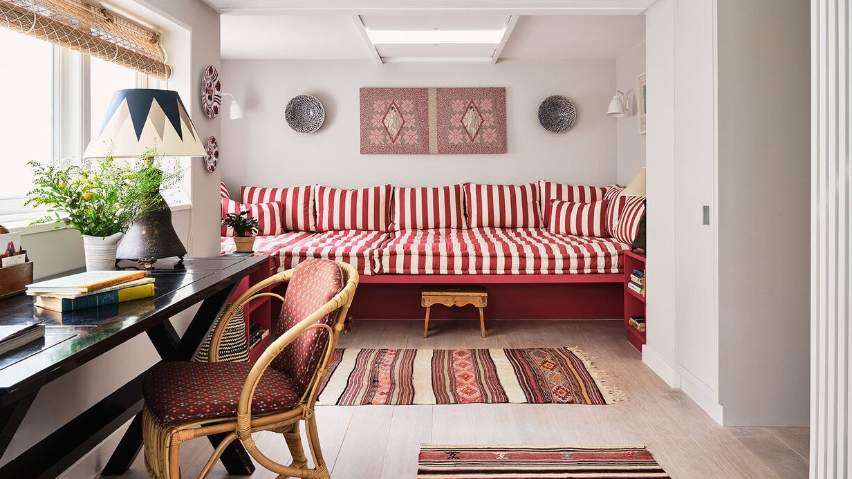 Image may contain: Home Decor, Architecture, Building, Furniture, Indoors, Living Room, Room, Rug, Chair, and Interior Design