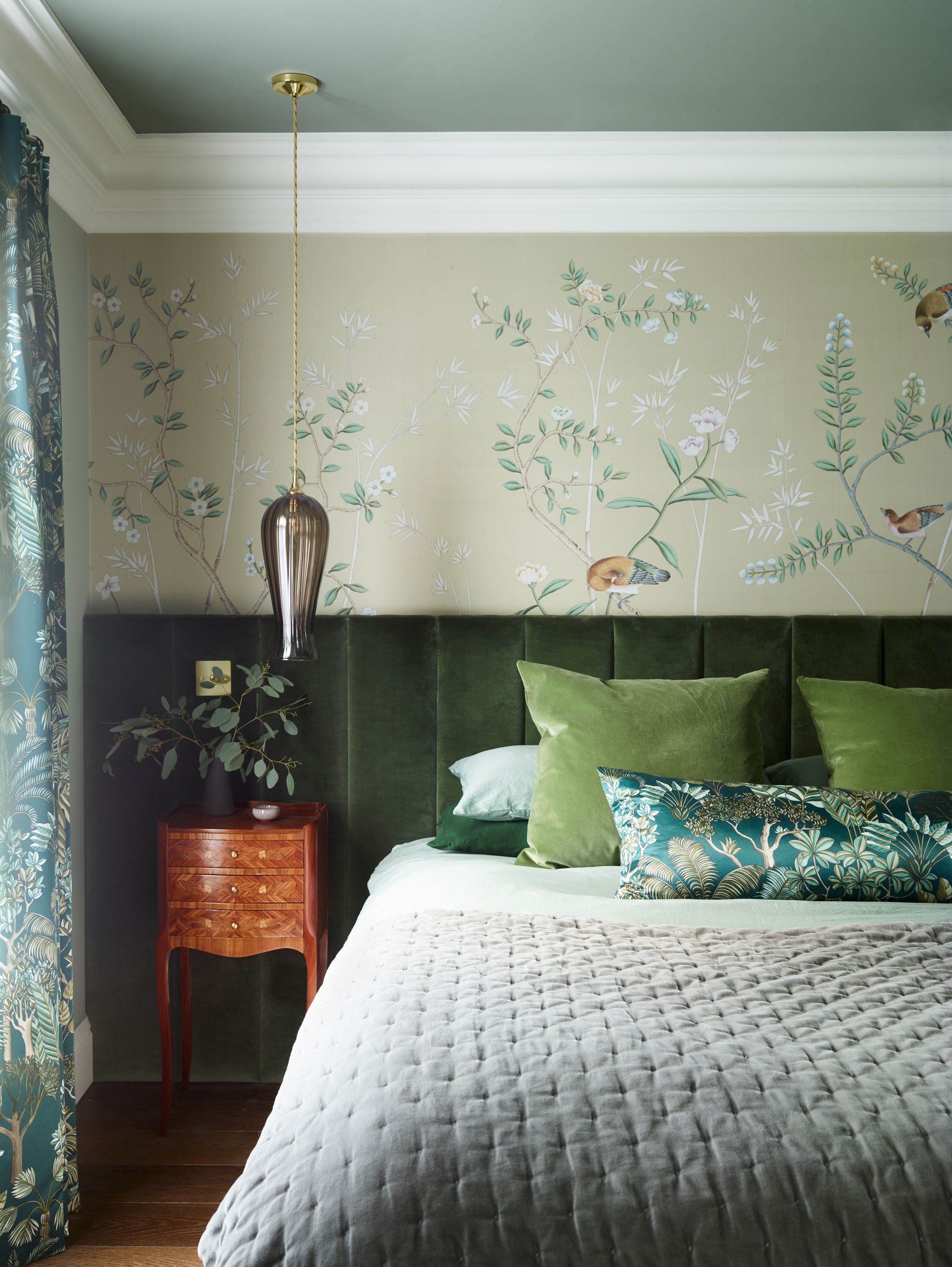 Image may contain: Cushion, Home Decor, Plant, Lamp, Bed, Furniture, Indoors, Interior Design, Bedroom, Room, and Pillow