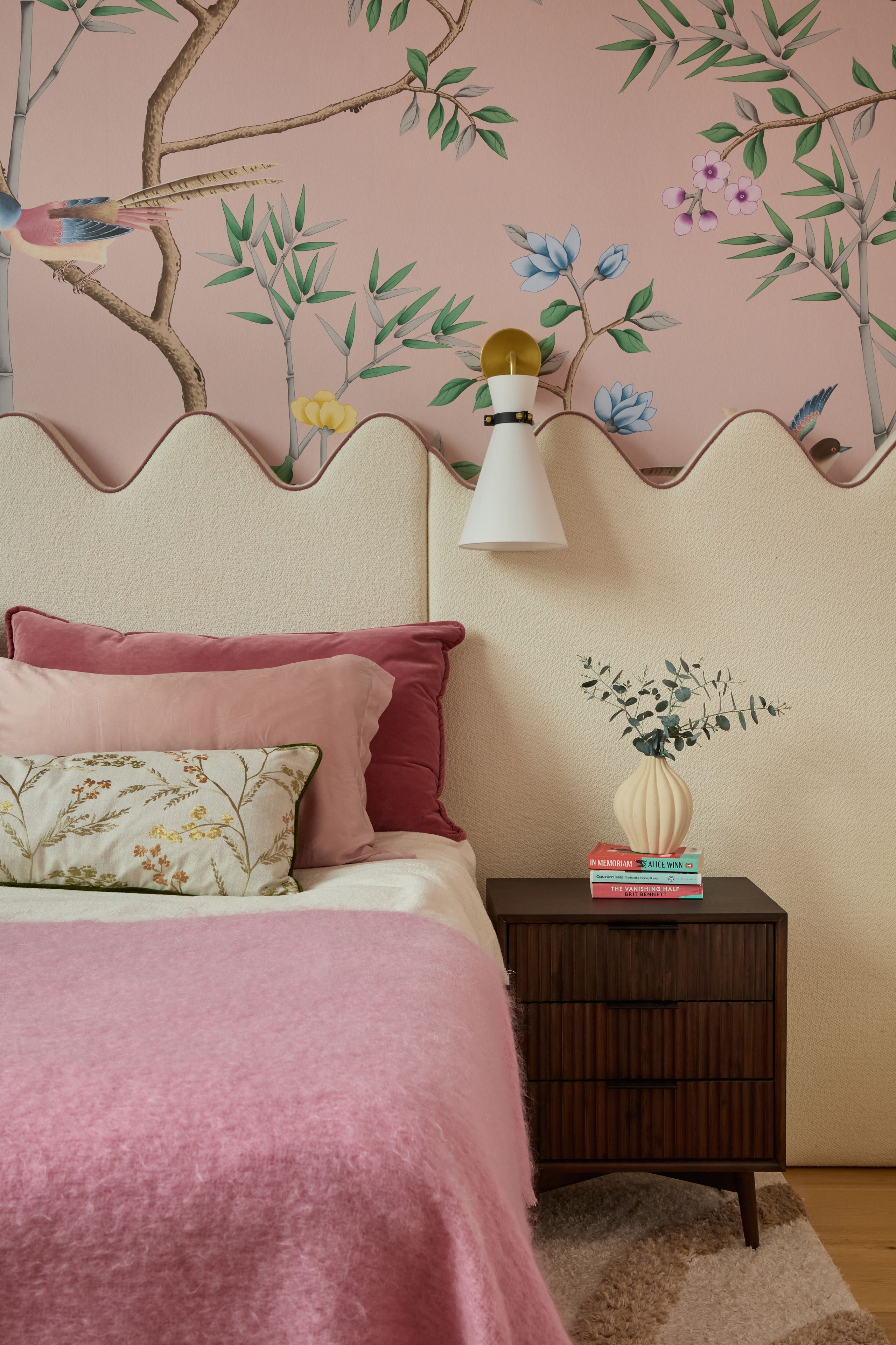 Image may contain: Indoors, Interior Design, Cushion, Home Decor, Architecture, Building, Wall, Rug, Bed, and Bedroom