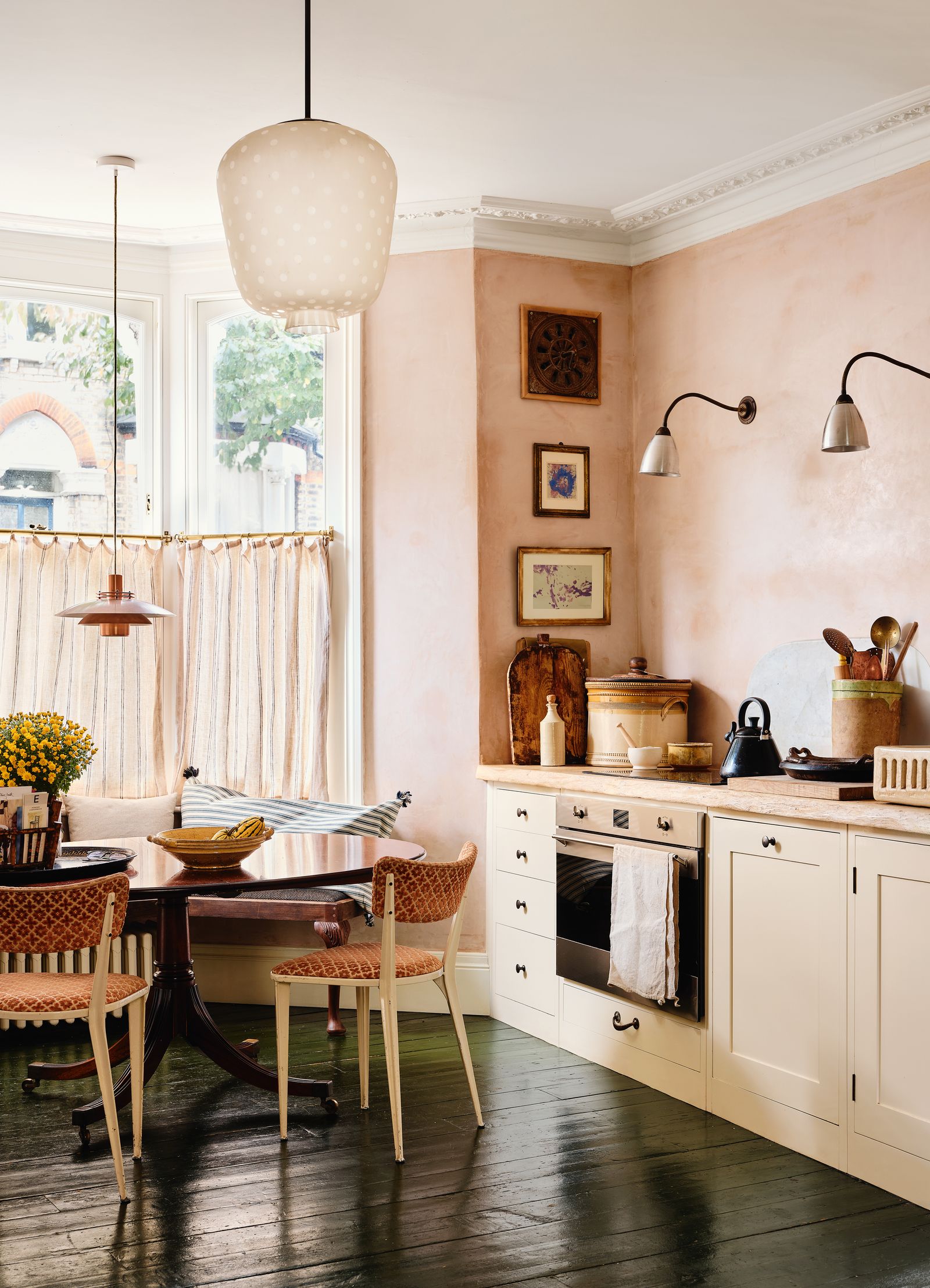 Image may contain Lamp Holly Howe Interior Design Pink kitchen pink plaster walls waxed plaster walls howe kitchen...