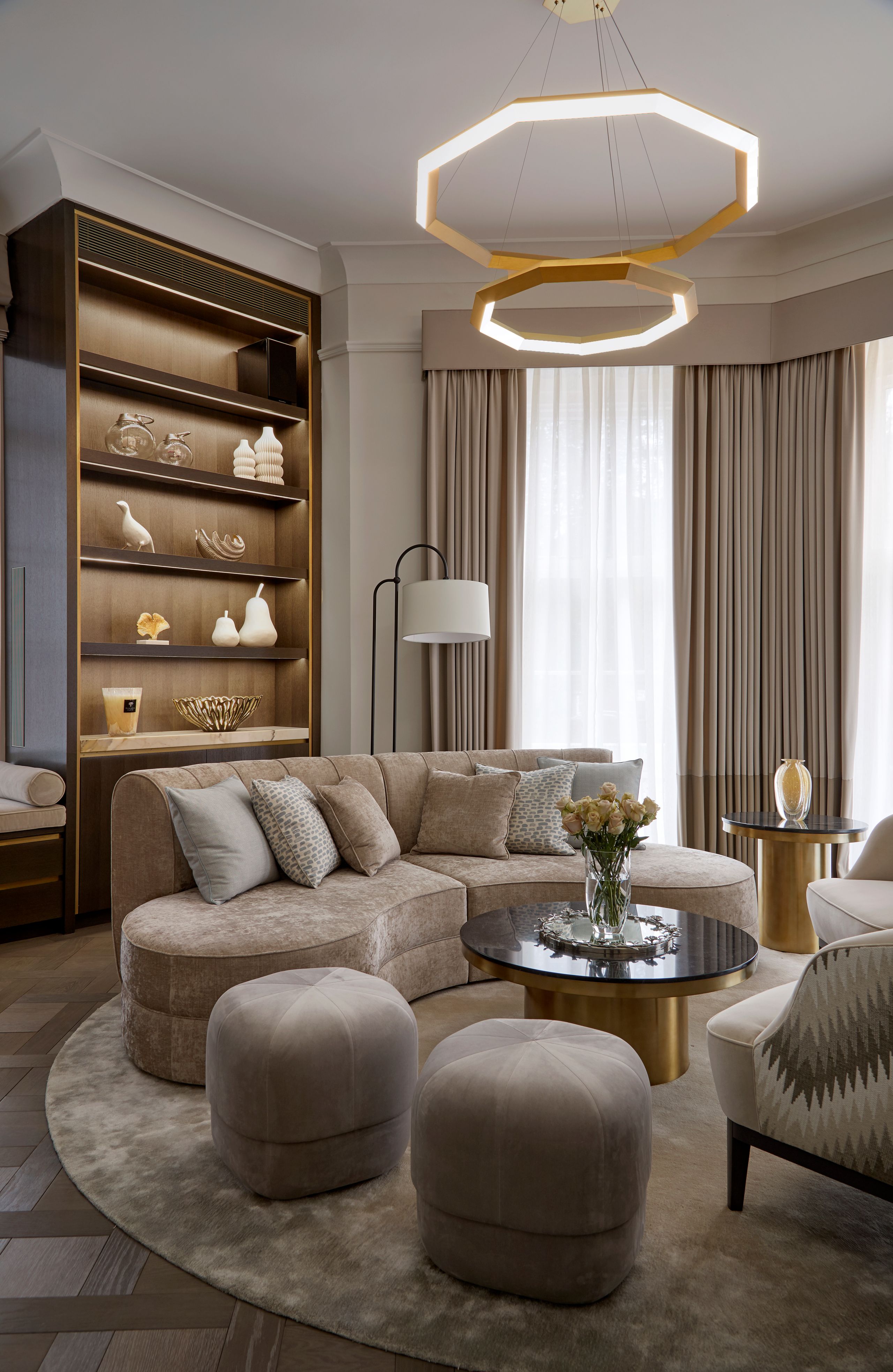 Image may contain: Furniture, Home Decor, Rug, Couch, Cup, Desk, Table, Chair, Animal, Bird, Lamp, and Chandelier