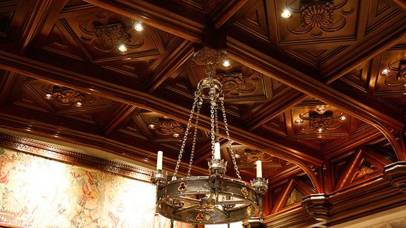 Image may contain: Chandelier, Lamp, Candle, Indoors, and Interior Design