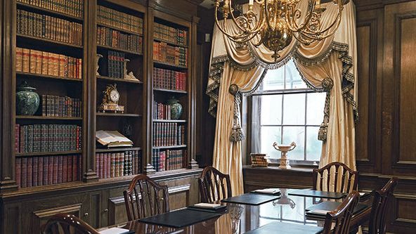 Image may contain: Furniture, Table, Architecture, Building, Dining Room, Dining Table, Indoors, Room, and Tabletop