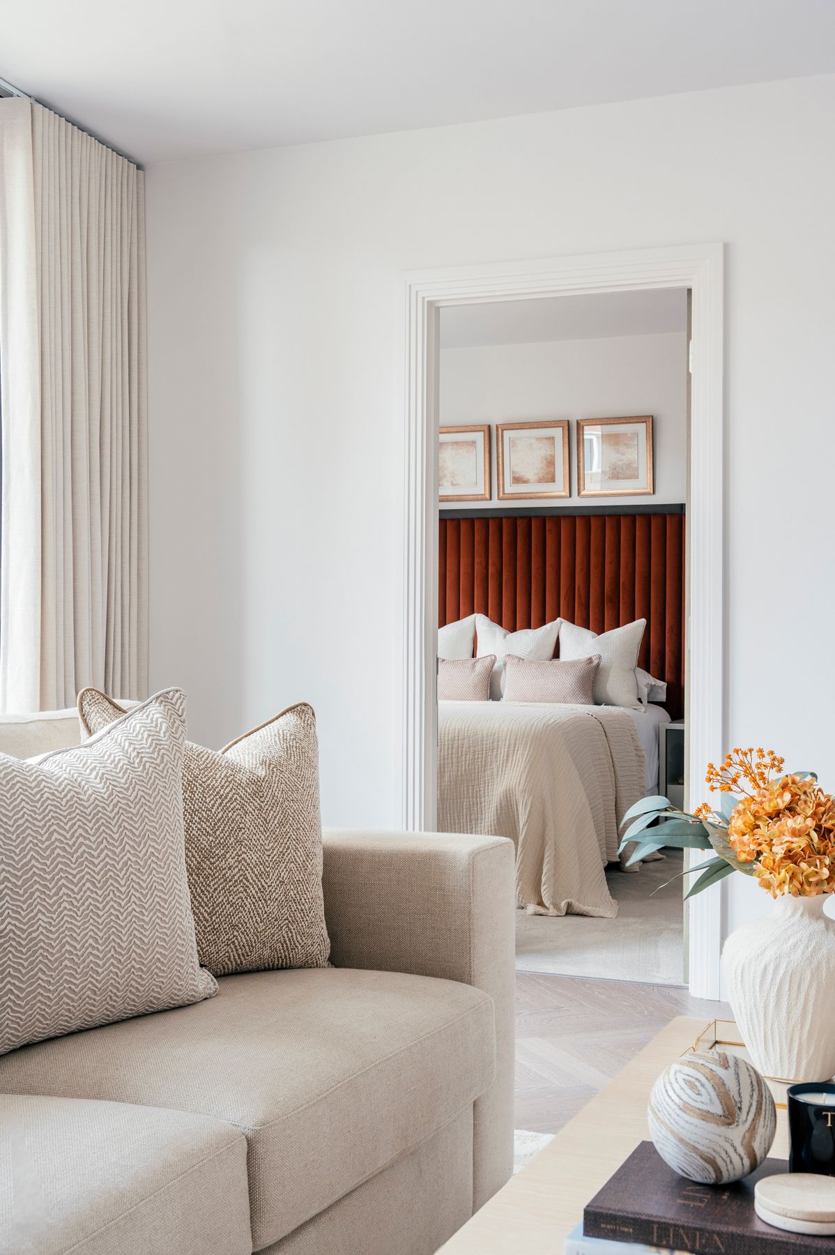 Image may contain: Cushion, Home Decor, Indoors, Interior Design, Corner, Pillow, Furniture, Couch, Art, Painting, and Book