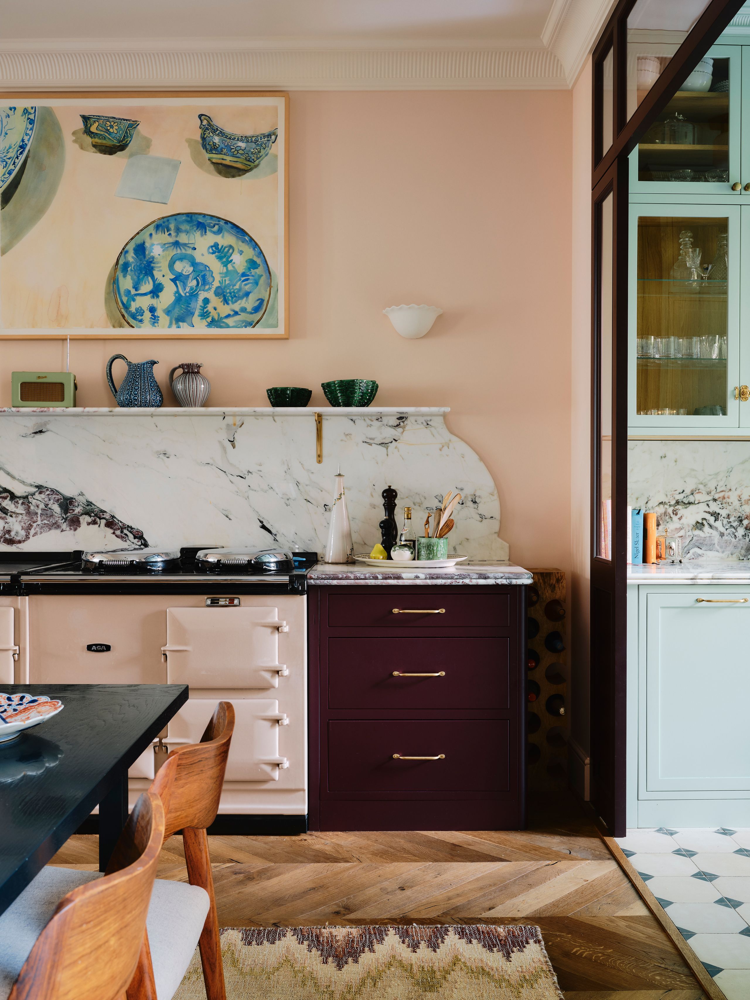 Image may contain: Indoors, Interior Design, Home Decor, Kitchen, Chair, Furniture, Rug, Desk, Table, and Architecture