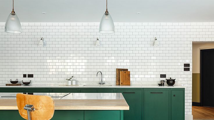 Image may contain: Indoors, Interior Design, Kitchen, Sink, Sink Faucet, Chair, and Furniture