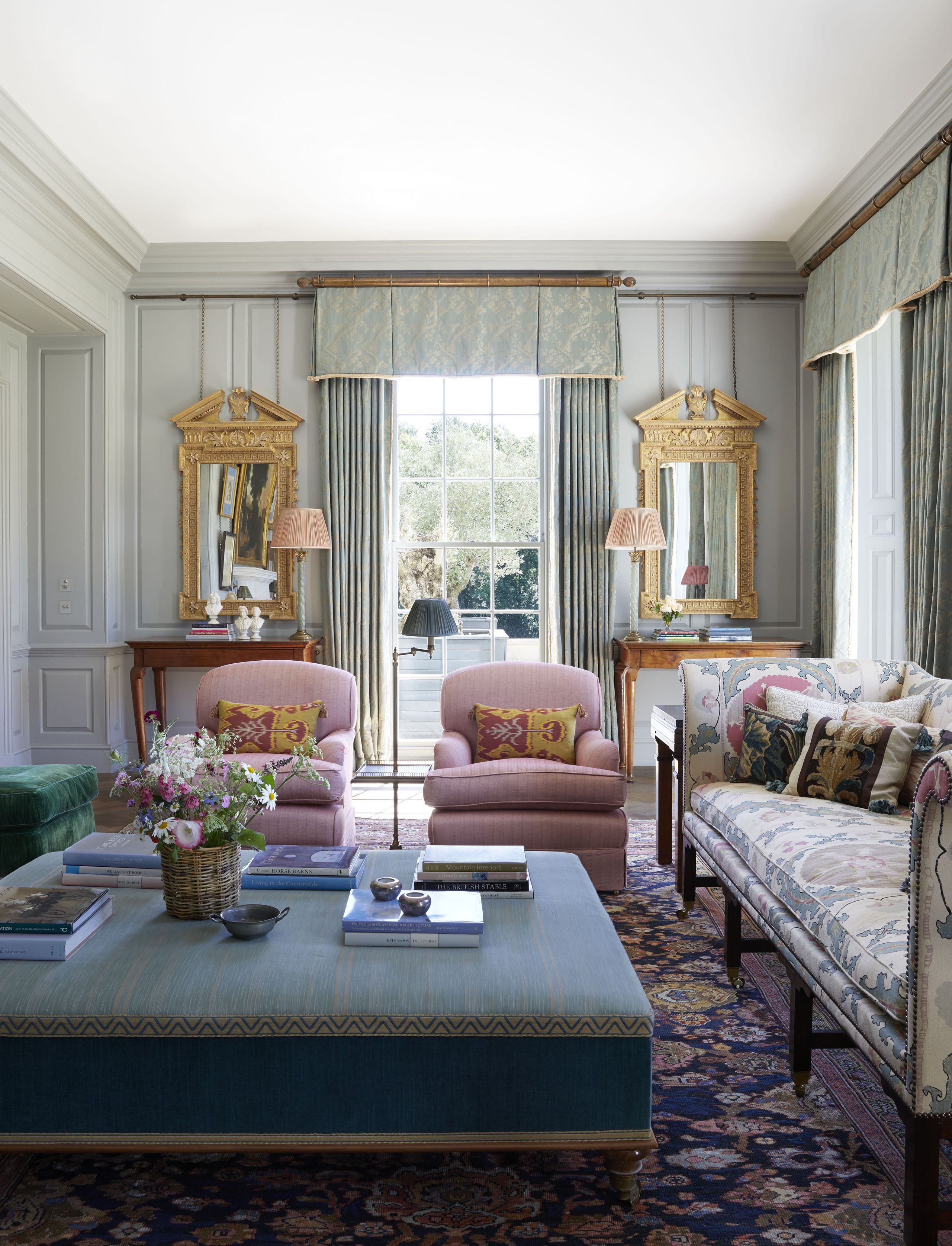 Image may contain: Lamp, Home Decor, Book, Publication, Couch, Furniture, Desk, Table, Architecture, Building, and Indoors