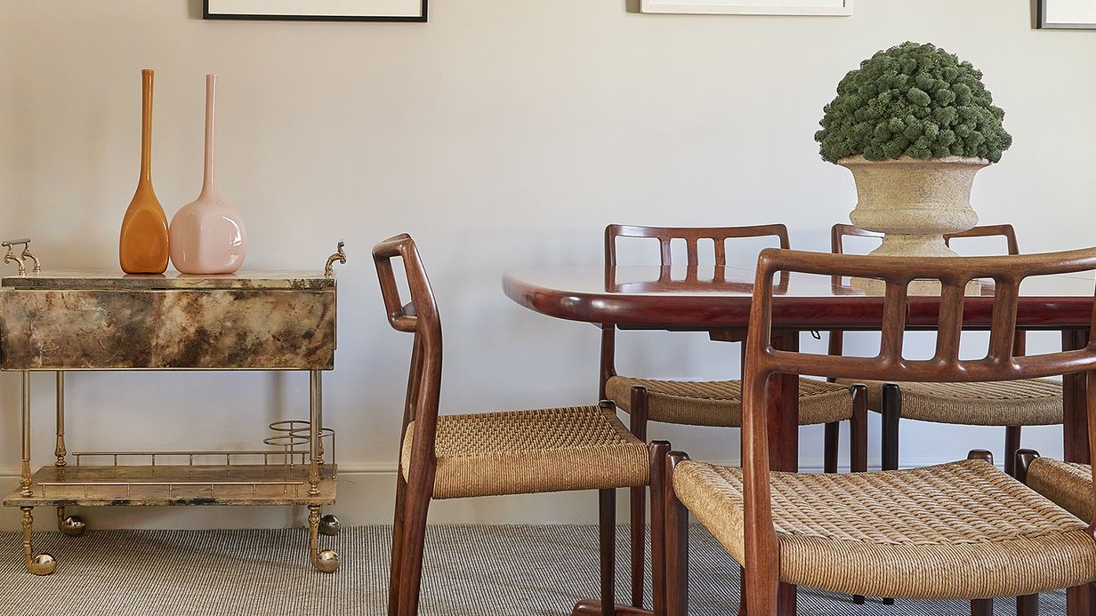 Image may contain: Architecture, Building, Dining Room, Dining Table, Furniture, Indoors, Room, Table, Plant, and Chair