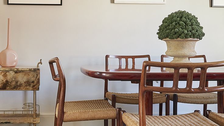 Image may contain: Architecture, Building, Dining Room, Dining Table, Furniture, Indoors, Room, Table, Chair, and Plant