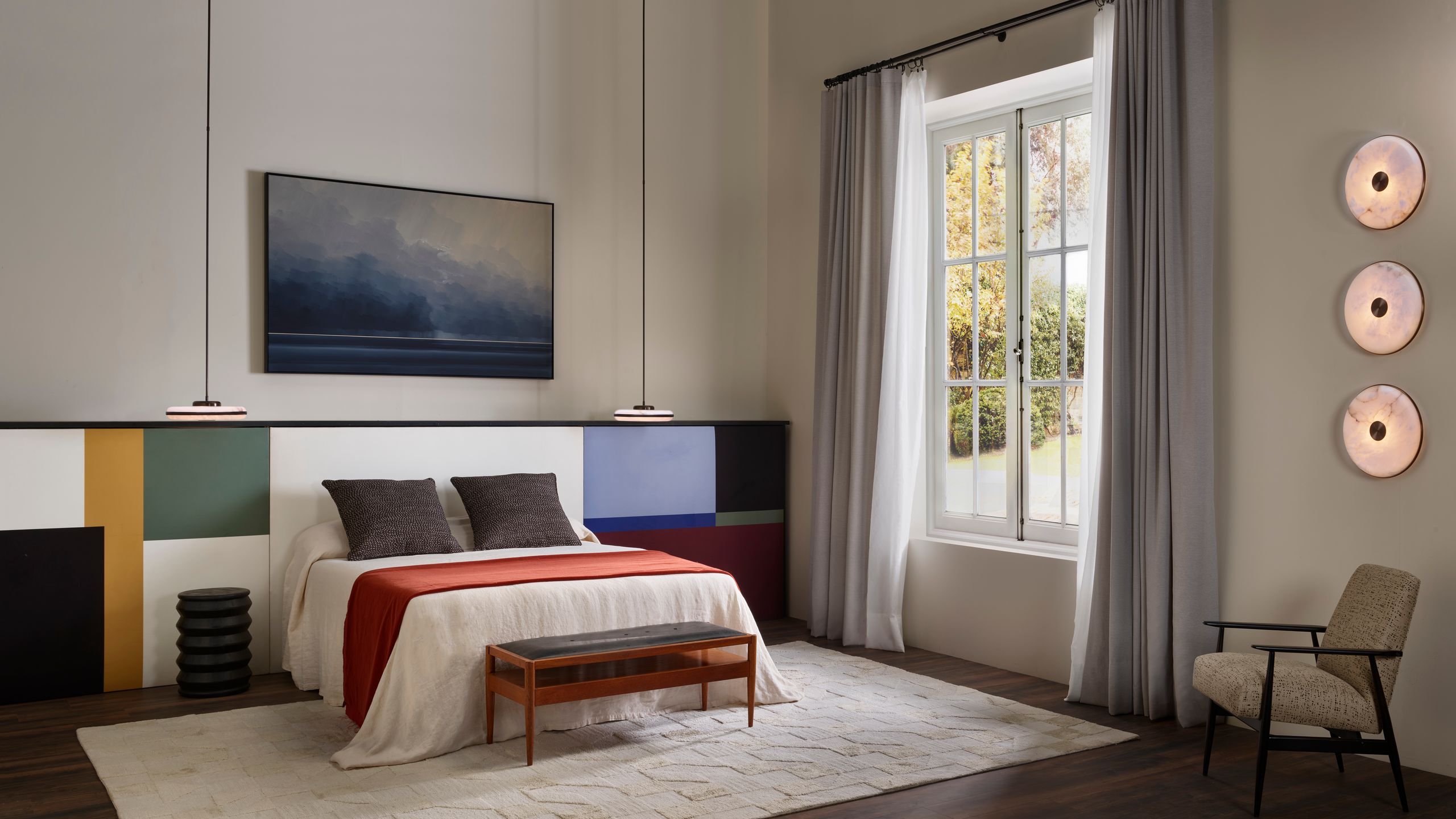 Image may contain: Corner, Home Decor, Rug, Chair, Furniture, Indoors, Interior Design, Bench, Bed, Bedroom, Room, and Door