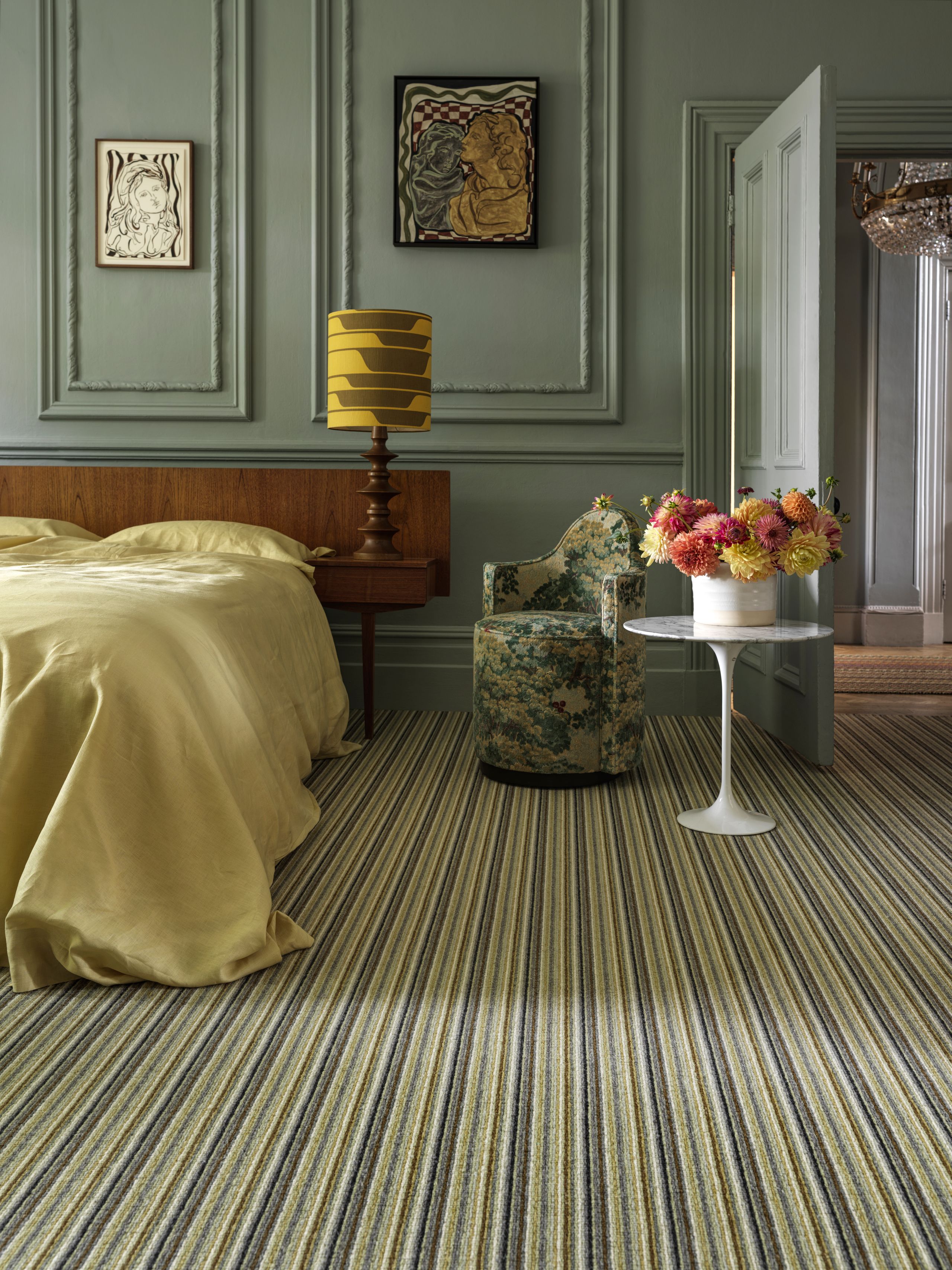 Image may contain: Home Decor, Rug, Lamp, Bed, Furniture, Floor, Desk, Table, Chair, Indoors, and Interior Design