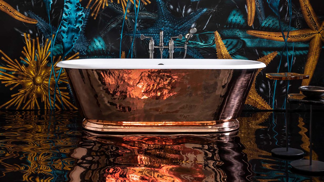 Image may contain: Tub, Bathing, Bathtub, and Person